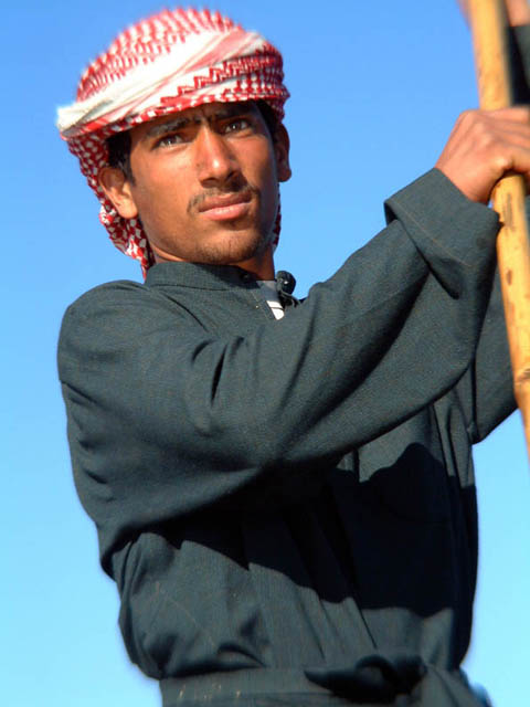 Boater in the Marshes, Iraq