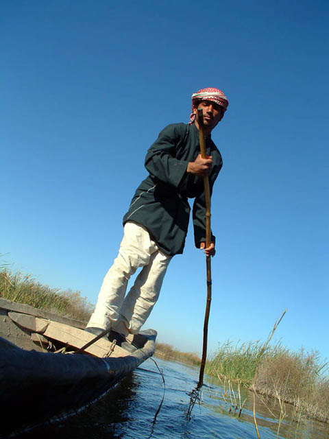 Boater in the Marshes, Iraq