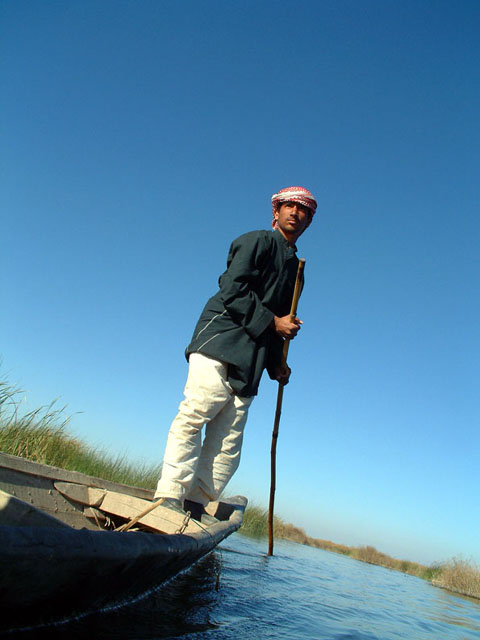 Boater in the Marshes, Iraq