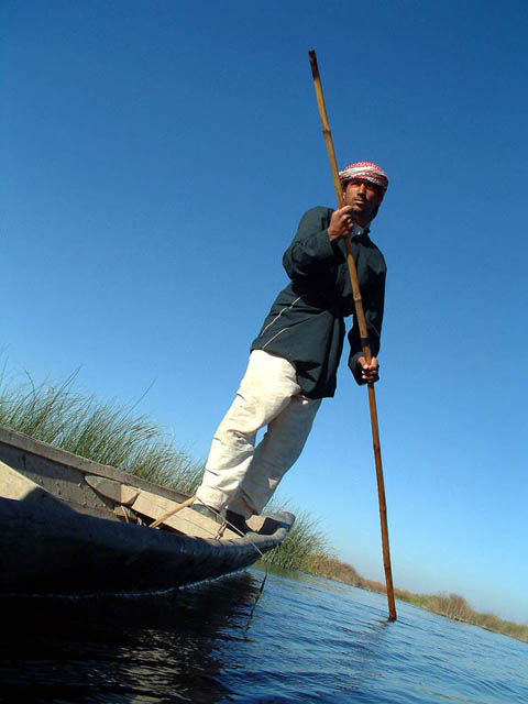 Boater in the Marshes, Iraq