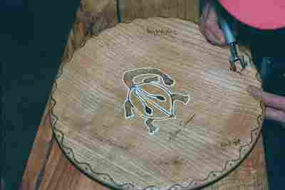 plate by Emmet Kane being engraved by all participants in Collaboration 2000au