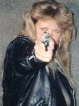 Erin aims for the eyes! (Texas Punk Junk)