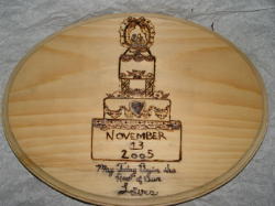 By Dustin.&nbsp; This is a custom piece given as a wedding gift.&nbsp; It's a wedding cake.&nbsp; :)
