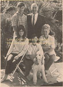 Skip and Mr. Beaudine standing; Kathy, Craig, and Mrs. Beaudine, seated; with their pet poodles