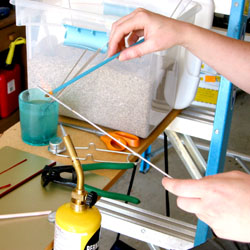 wrapping the glass around the mandral...burn this color and it turns rusty...pretty....but not blue...