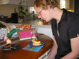 blowing out the requisite candle