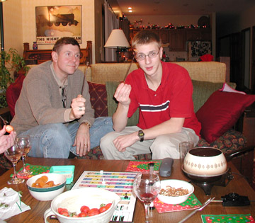 fondue forks poised, al and dad think of songs incorporating the word "hold"....