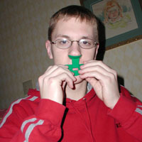 alex tries to figure out the nose harp...only ryan knew how to use it at first...