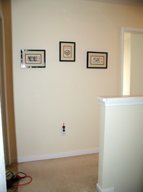 upstairs hallway.....mimi's still not sure from whence these prints came...