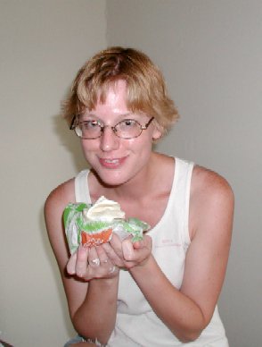 colleen eats dinner with that strange look on her face...