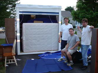 ta DAH, the pod is full and the men are pleased...and there's still stuff in the driveway...