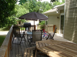 deck!&nbsp; the huge wood table conveys...