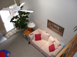 looking from the upstairs offices down to the family room