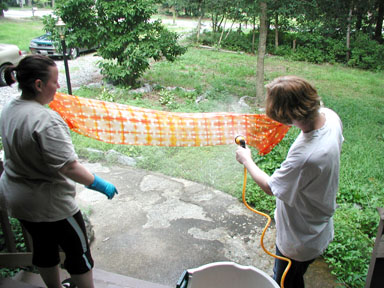 rinsing the final product in the front yard