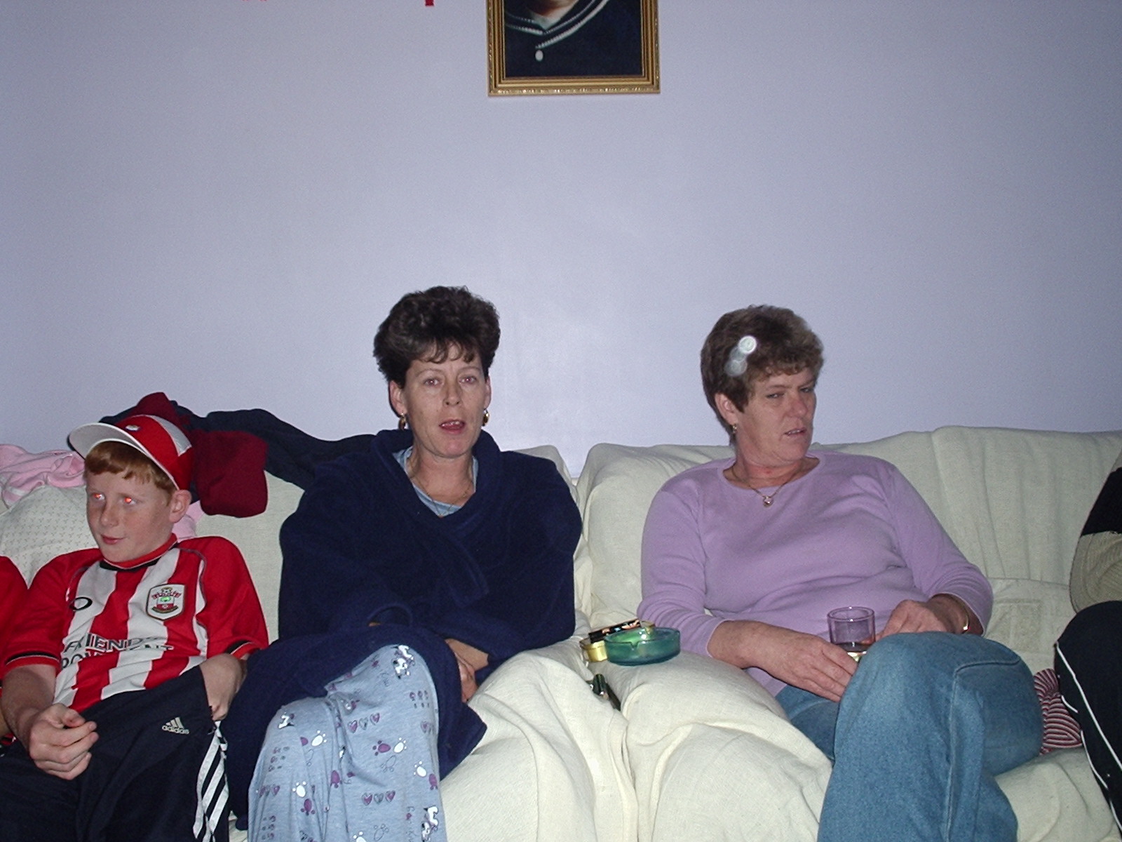See that on my auntys hair!? this one is strange and my first thoughts were that it was something to do with the camera. If you zoom in on it you can see that it is actually 4 orbs riht next to each other. I beleave this is because they were moving, what about you?