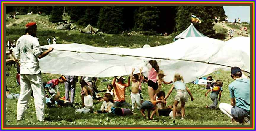 12_inch_Children_under_tarp.JPG (98365 bytes)