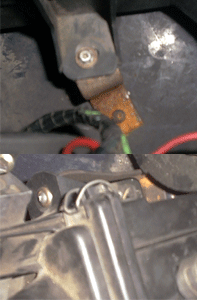 VK EFI cars have the air box mounting brackets welded to the car. In this installation, thin steel brackets were made to install the air box in the factory location. Self-tapping screws hold them in place. The project car experienced some air box instability with only two brackets. A consequence of this was occasional squeaking and moving around when the engine was idling. If the process was to repeated, the dimensions and positions of all VK EFI brackets would be copied as closely as possible.