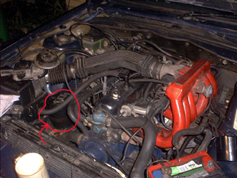 With the manifold (& bits) and air box on, it was time to fit the air piping, and relocate the charcoal canister (note its new position.) Don't be deceived by the picture - there are a fair few steps left! Also evident are a coffee cup and wiring diagrams, both of which made the job possible!