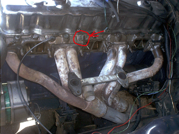 The carb and manifold was then removed. While the opportunity was there, the Coolant Temperature Sensor was fitted, as shown.