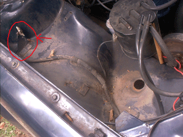 The 
                        side of the car after the old bottles were removed. Note the old bracket that was in the way of the new water bottles. This was bent out of the way.