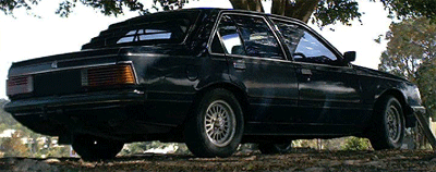The Project Car, dubbed "208 Fireball." The car is an indigo blue 1982 Holden Commodore VH SL/X, which was factory optioned with cruise control. 