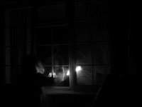 Faces at the windows.