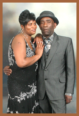 Elderly man n Hat and women