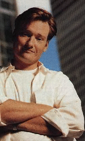 OOH! Crossing his arms AND smiling!
