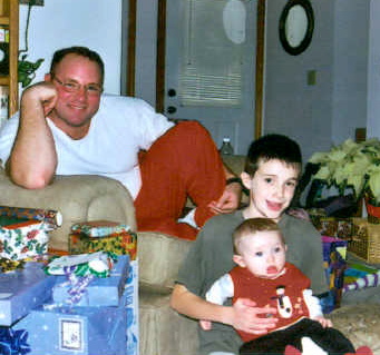 This is my husband, Jeff, with Anthony holding John