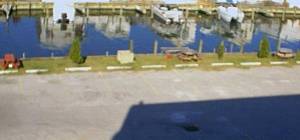 canal, dock, picnic tables, grills