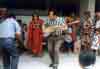 I am dancing with tribal workers.