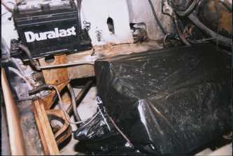 engine covered for pressure washing the bay