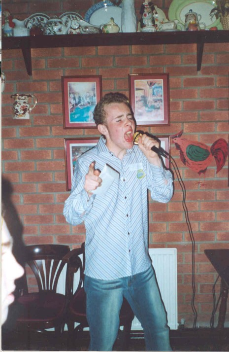 Jon singing on the karaoke... 'Crocodile Rock' I believe it was.