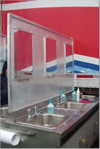 full-sized sinks complete with mirrors & soap dispensers!