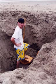 Brad digs our traditional hole