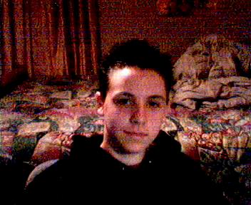 A pic of me sittin at my desk on my web cam