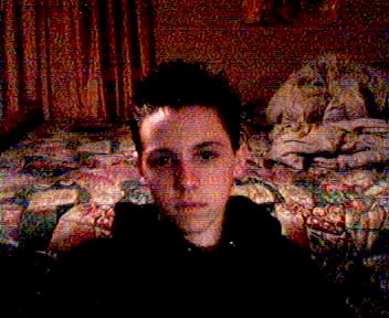 A pic of me sittin at my desk on my web cam