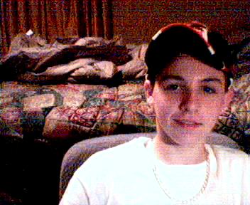 A pic of me sittin at my desk on my web cam