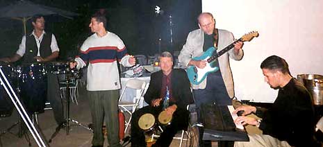 Bruce Lindsay, Jack Crompton, and the Brothers at a party