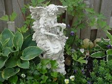 An angel watches over the water garden