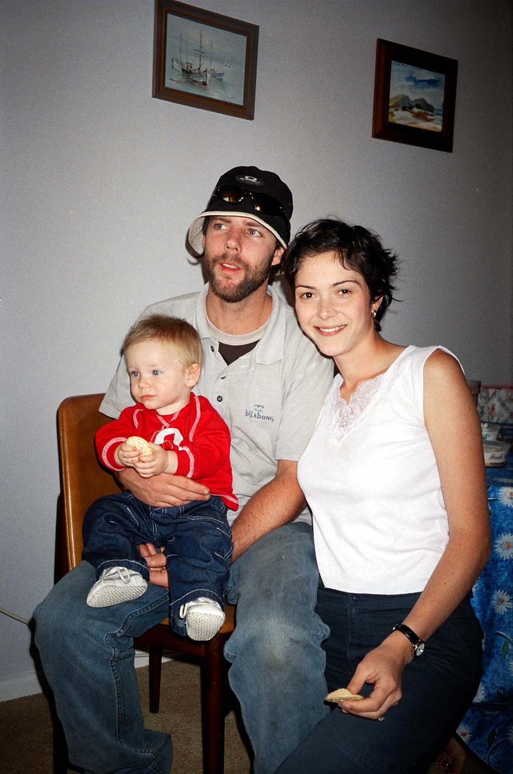 Casey is happy with Mum, Dad and food.