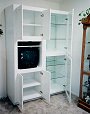 MDF cabinets designed, built, and put in later, matching lighted display cabinet in prior picture