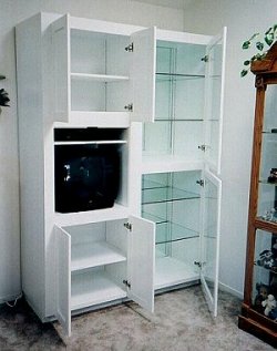 MDF cabinets designed, built, and put in later, matching lighted display cabinet in prior picture