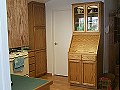 Sarah's kitchen - Custom designed roll-top desk with lighted top display, oak plywood, solid oak railings