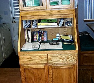Custom designed roll-top desk with lighted top display