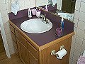 Sarah's Main bathroom - Custom design, oak plywood, solid oak trim, white melamine interior.