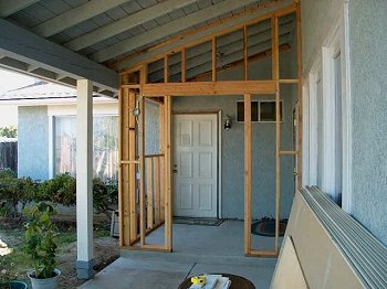 Porch addition job - redoing entire wall and door area going into additon from garage side