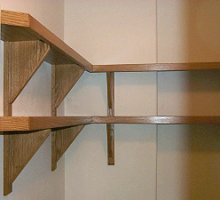 Shelving around top of computer closet