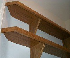 Shelving around top of computer closet