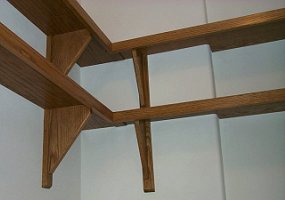 Shelving around top of computer closet